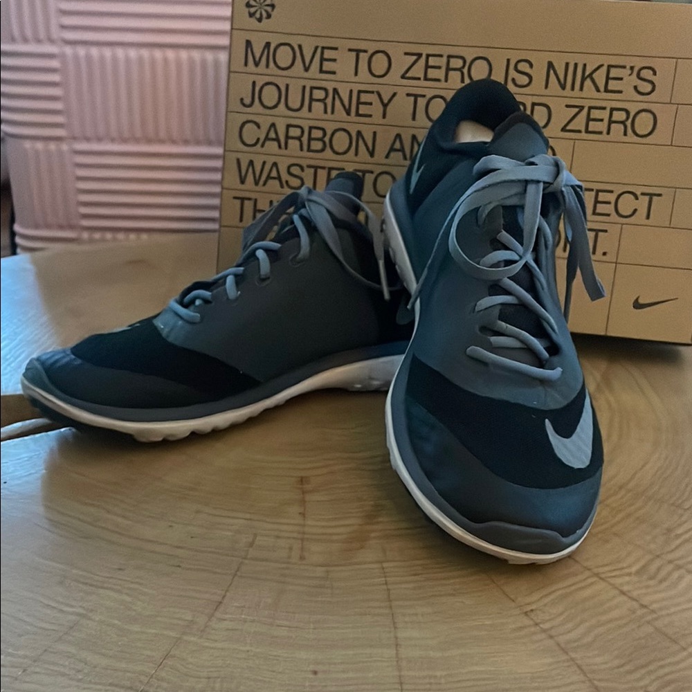Nike Black and Gray Sneakers with Breathable Mesh and Sleek Design